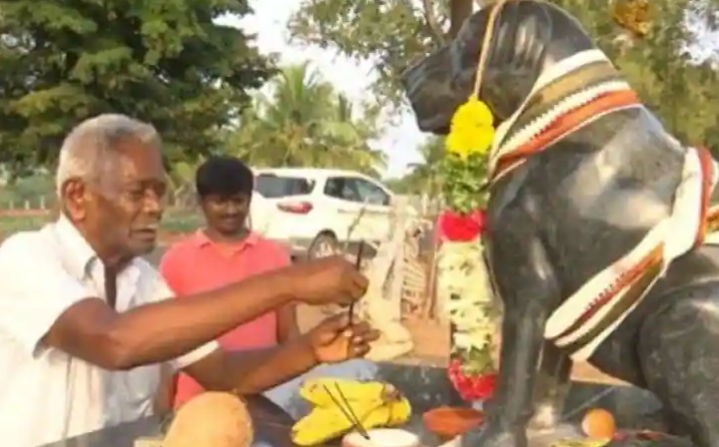 a tamil man muthu make his dog statue