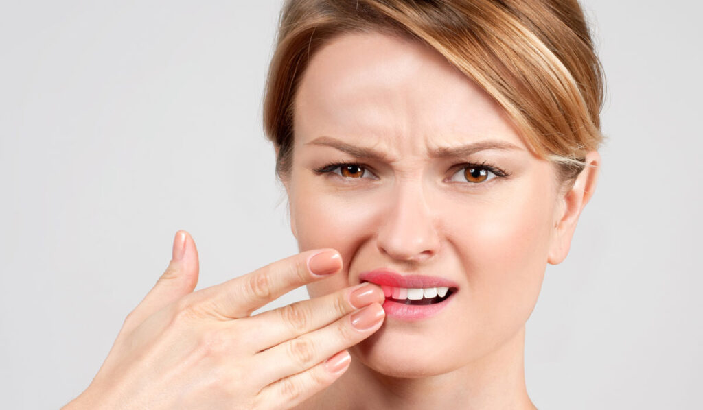 What does the blood in the toothache indicate?